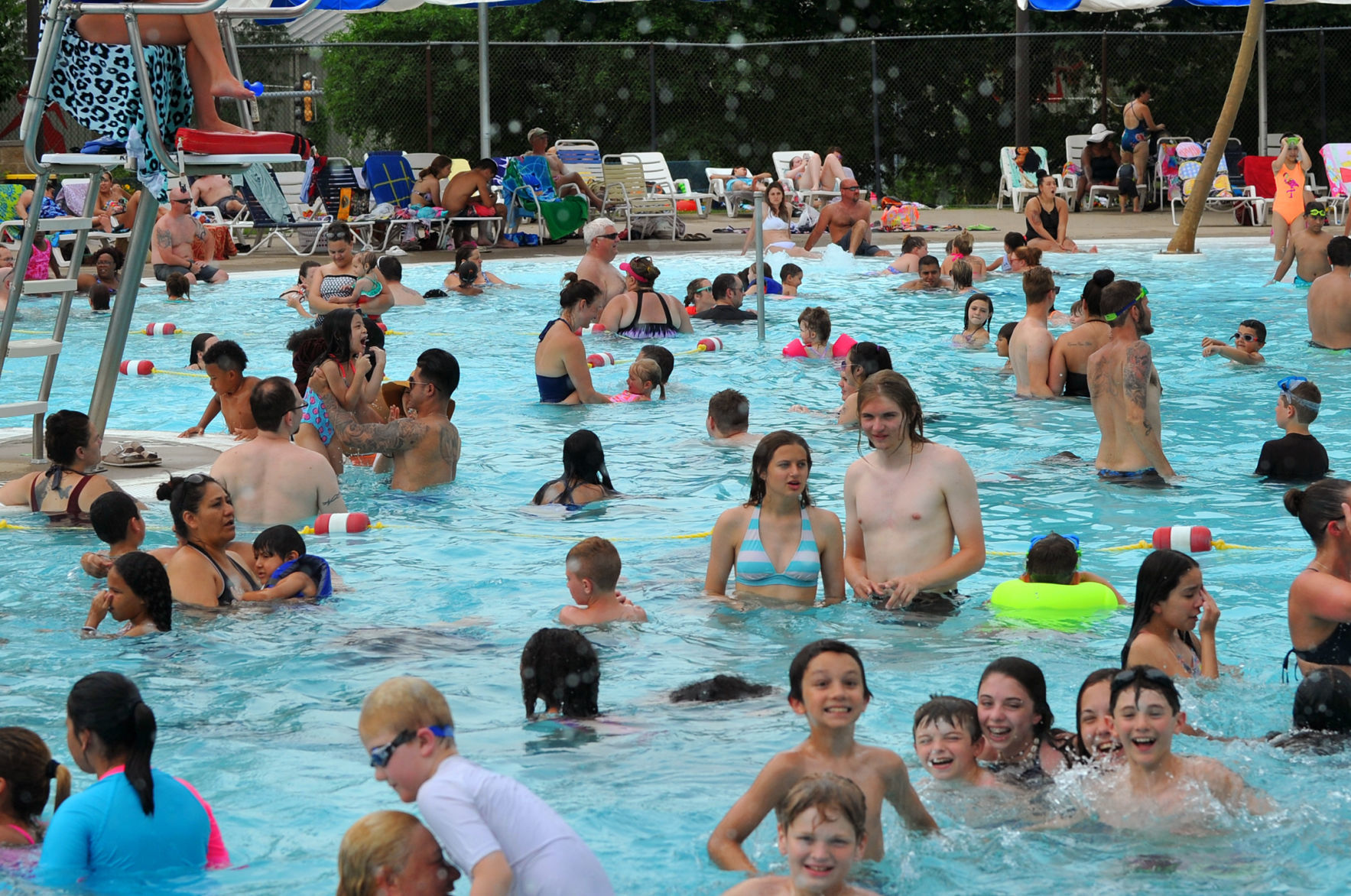 People cooling off on a hot day at Splash Landing in Bettendorf.